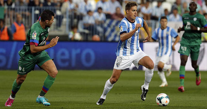 Rescaldani, en una imagen con el Málaga / Málaga CF